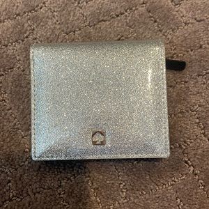 Kate spade silver sparkly wallet.